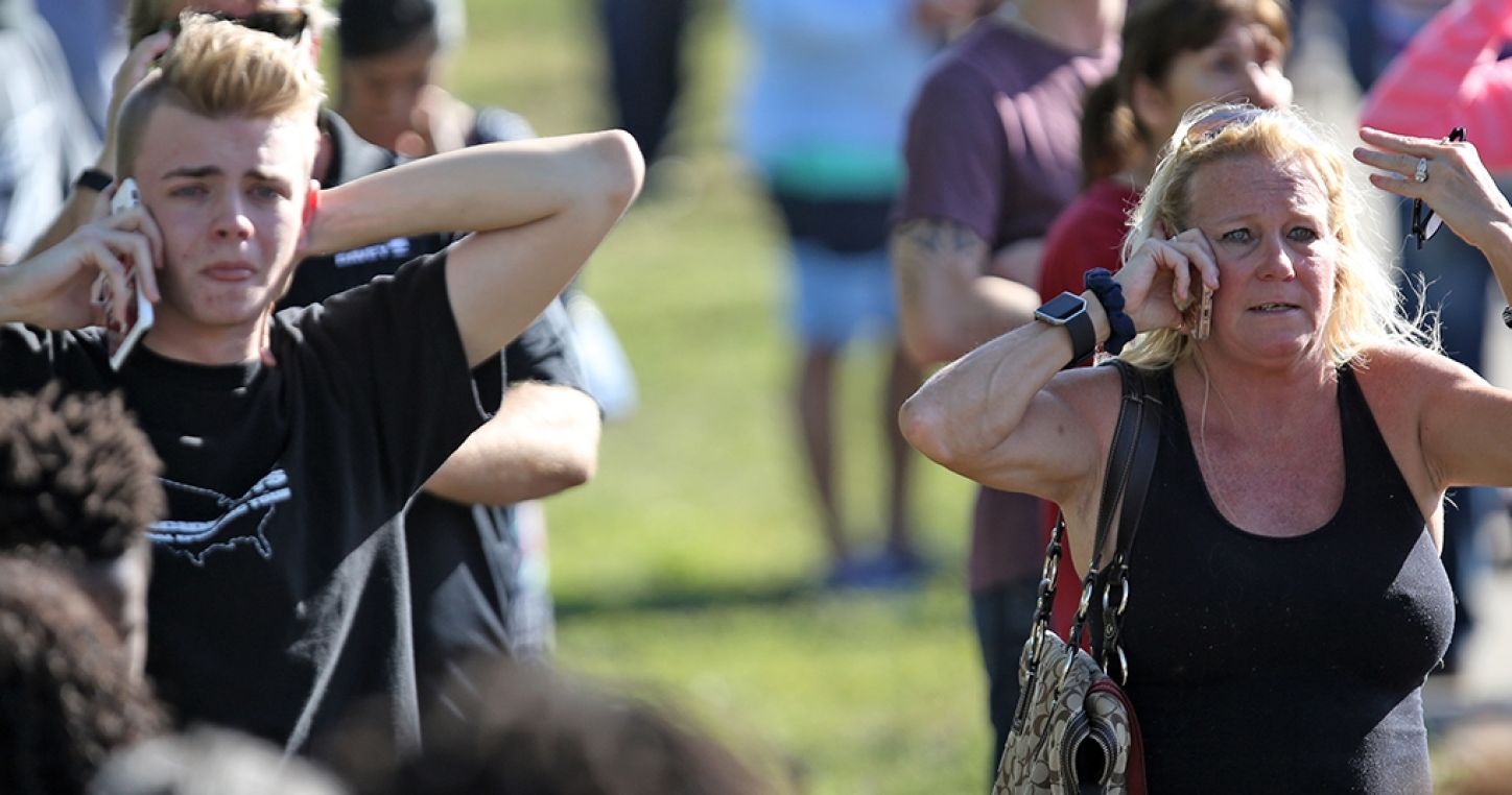 Waiting for word from students just south of the campus of Stoneman Douglas High School in Parkland, Florida. Photo: Amy Beth Bennett/Abaca/Reporters