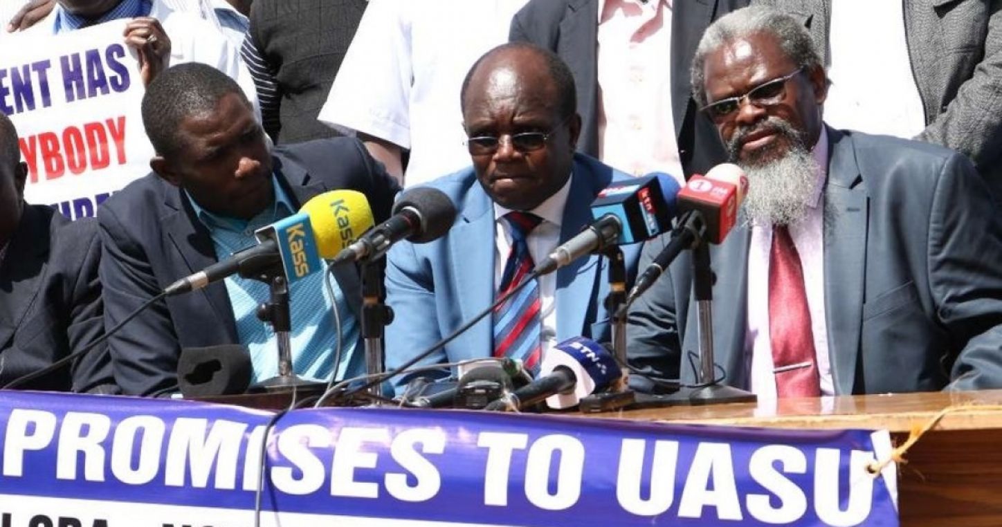 Secretary General of KMPDU -Ouma Oluga,UASU Secretary General Constantine Wasonga and UASU Chairman Muga K'olale issuing a joint press statement at Kenyatta Hospital concerning Doctors and Lectures strike respectively, March 1. Credits: www.the-star.co.ke/news/LANGAT K. COLLINS