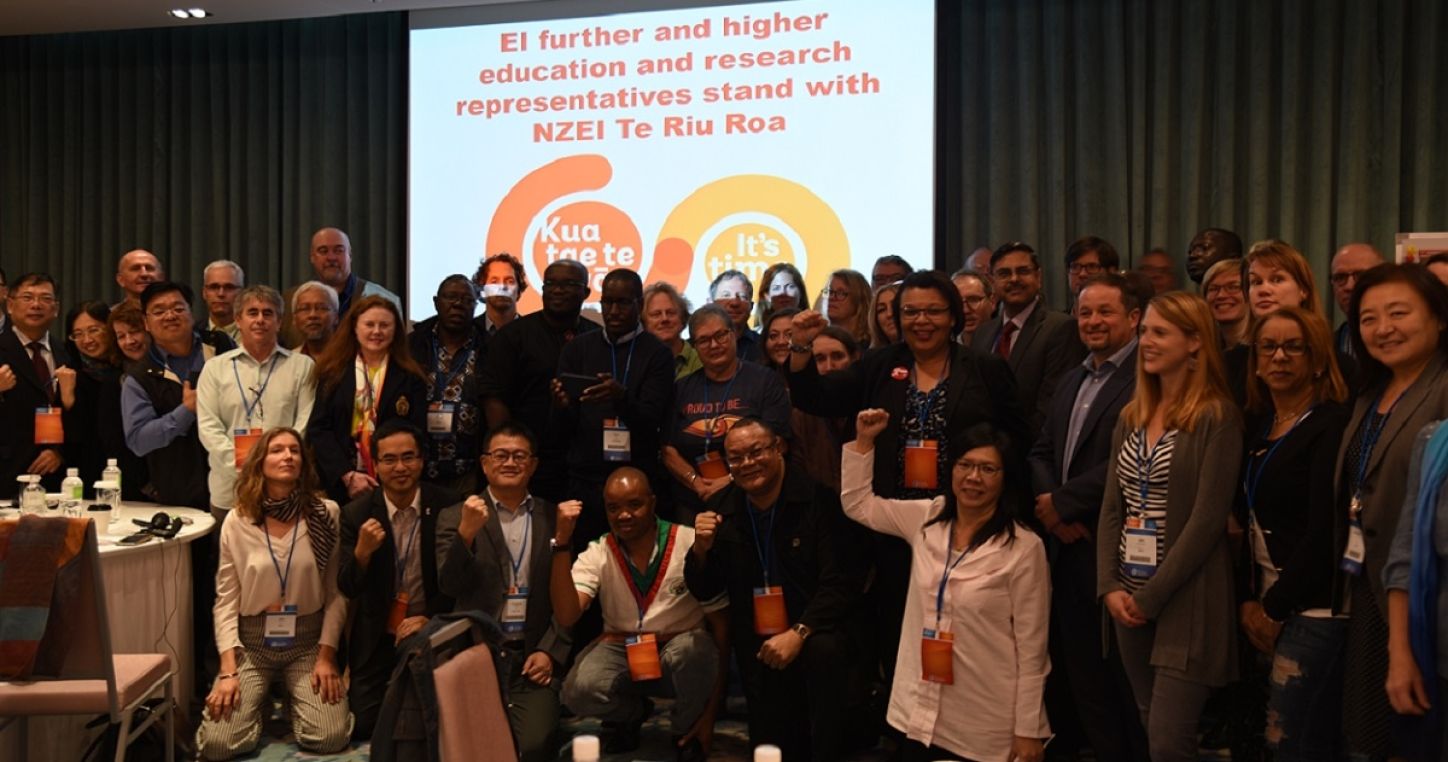 Participants to the 11th EI IFHERC in solidarity with colleagues in New Zealand.