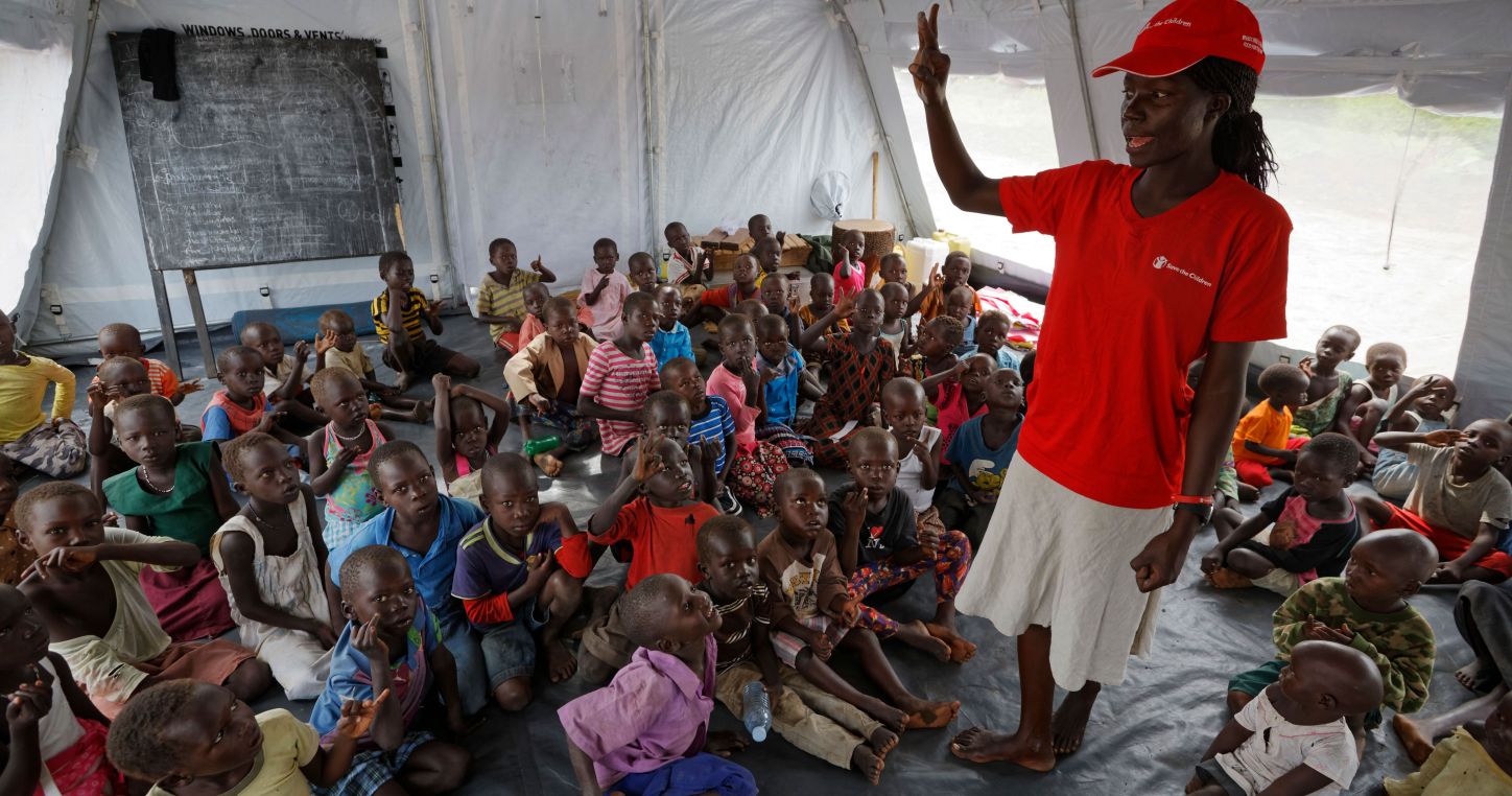 Ben Curtis / AP / ISOPIX | Ugandan teacher instructs young South Sudanese refugee children